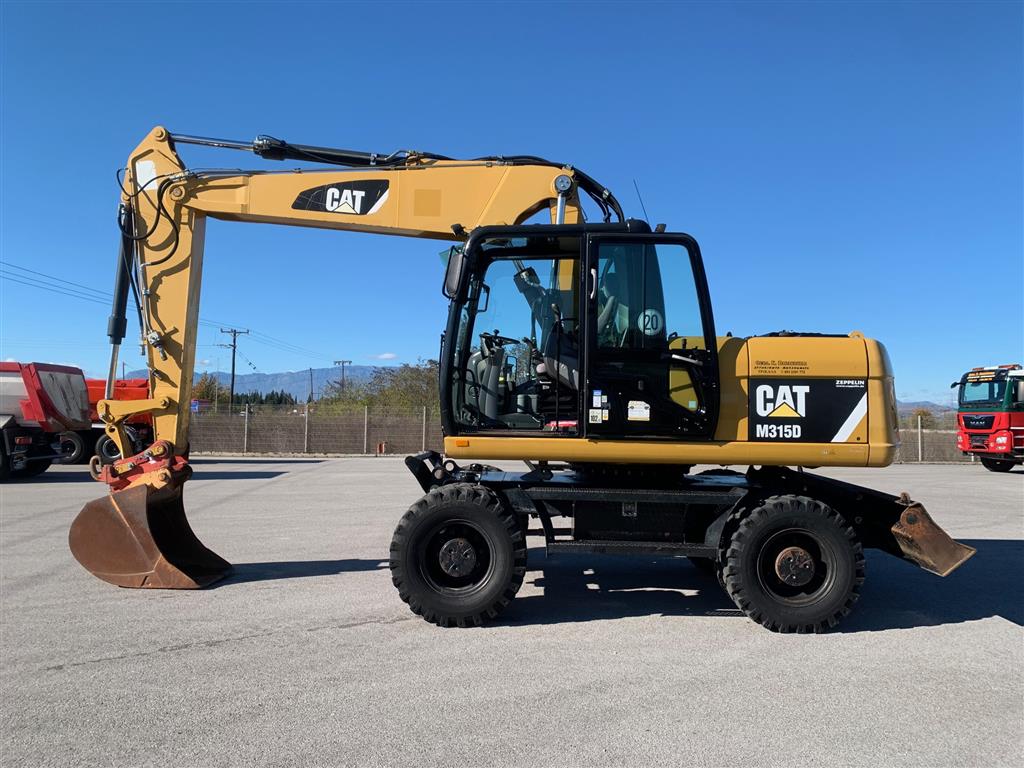 (α/α: 2901) Εκσκαφείς Ελαστικοφόροι, caterpillar M 315 D ΚΟΥΒΑΣ Ο,70  - ΠΛΑΤΟΣ 2,50
